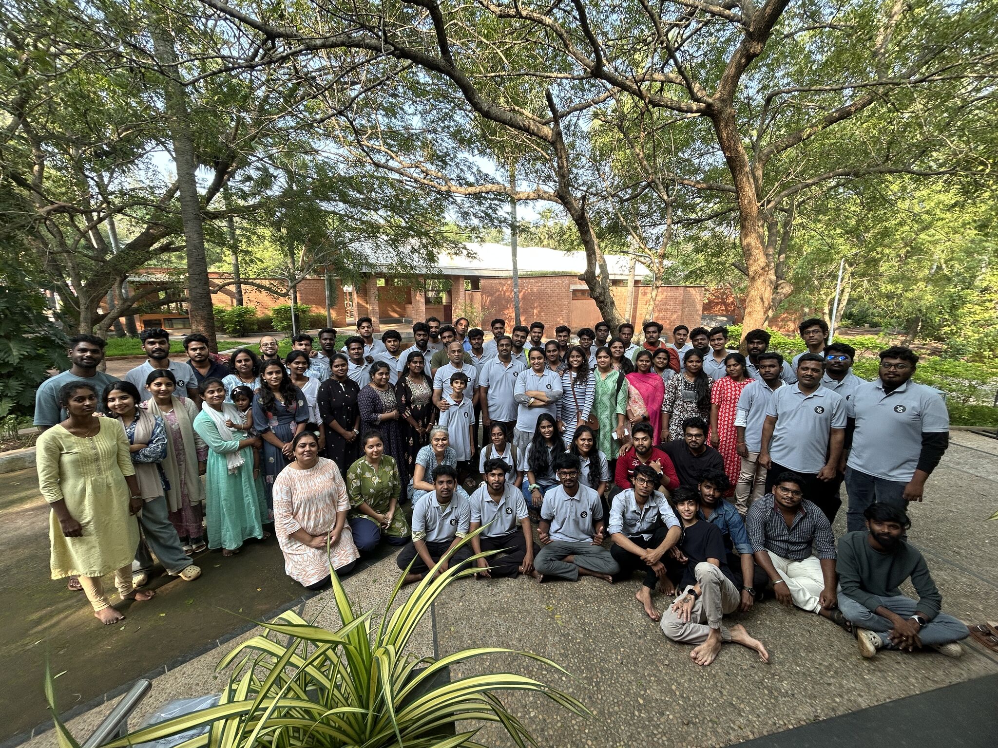 The Yuvabe team gathered outdoors on the studio campus in Auroville.